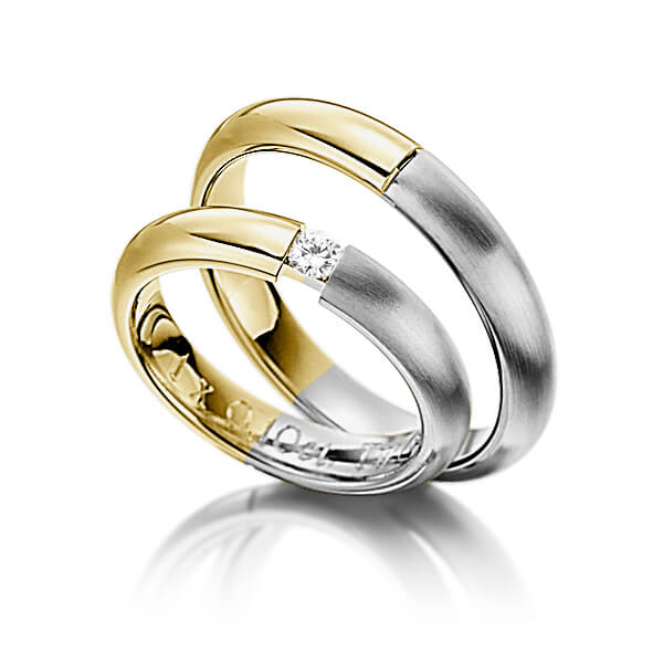 Set Bicolor trouwringen in geelgoud 14 kt. dark grey gold 14 kt. met in totaal 0,25 ct. Briljant tw/si van Eternal Touch