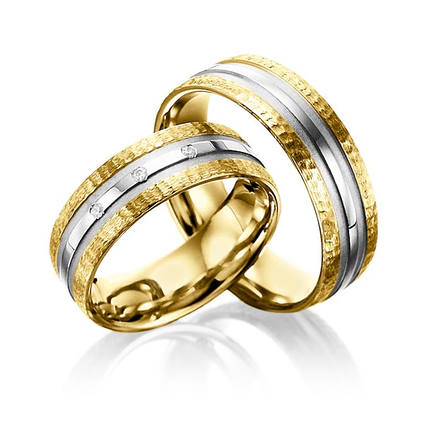 Set Bicolor trouwringen in geelgoud 14 kt. grijsgoud 14 kt. hamerslag, met in totaal 0,03 ct. Briljant tw/si van Merii
