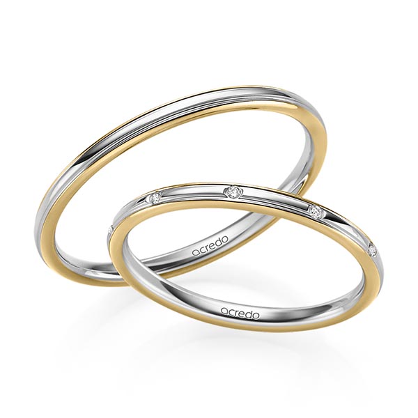 Set Bicolor trouwringen in geelgoud 14 kt. grijsgoud 14 kt. met in totaal 0,025 ct. Briljant tw/si van acredo