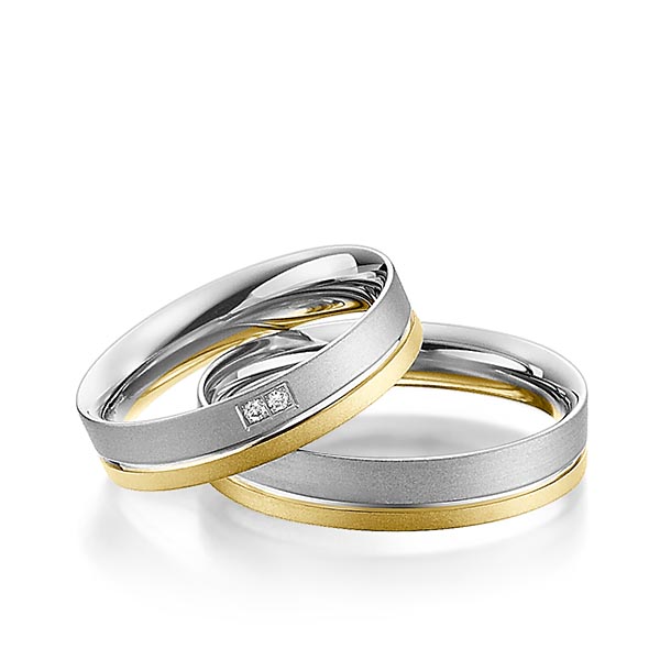 Set Bicolor trouwringen in geelgoud 14 kt. grijsgoud 14 kt. met in totaal 0,02 ct. Briljant tw/si van Steinberg