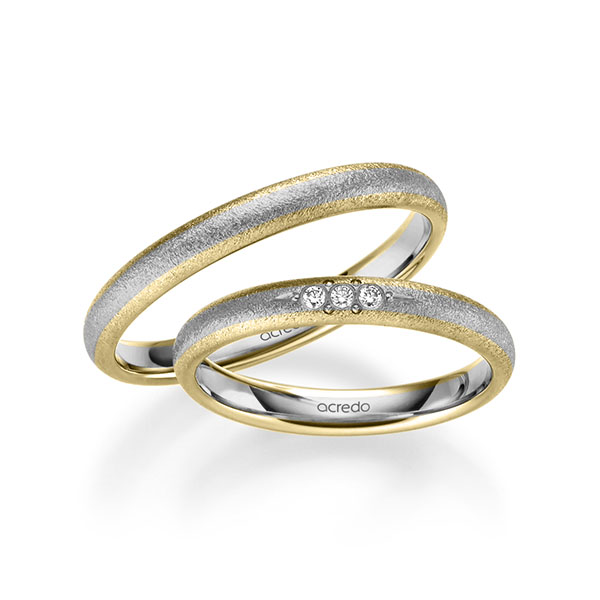 Set Bicolor trouwringen in geelgoud 14 kt. grijsgoud 14 kt. met in totaal 0,045 ct. Briljant tw/si van acredo