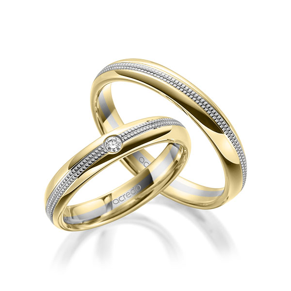 Set Bicolor trouwringen in geelgoud 14 kt. grijsgoud 14 kt. met in totaal 0,05 ct. Briljant tw/si van acredo