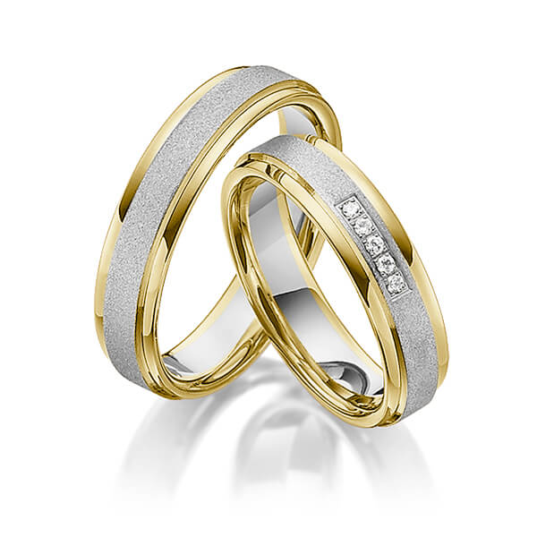 Set Bicolor trouwringen in geelgoud 14 kt. grijsgoud 14 kt. met in totaal 0,05 ct. Briljant tw/si van Steinberg