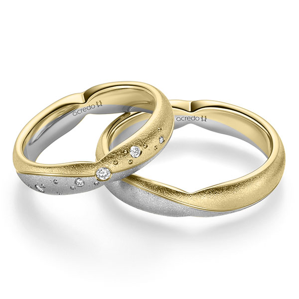 Set Bicolor trouwringen in geelgoud 14 kt. grijsgoud 14 kt. met in totaal 0,065 ct. Briljant tw/si van acredo