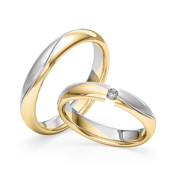 Set Bicolor trouwringen in geelgoud 14 kt. grijsgoud 14 kt. met in totaal 0,06 ct. Briljant tw/si van Merii