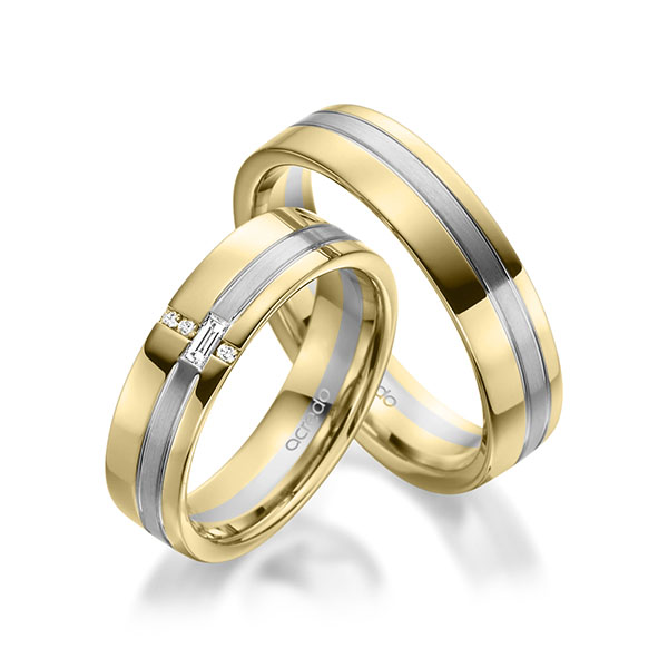 Set Bicolor trouwringen in geelgoud 14 kt. grijsgoud 14 kt. met in totaal 0,074 ct. Baguette-Diamant & Briljant tw,vs tw/si van acredo