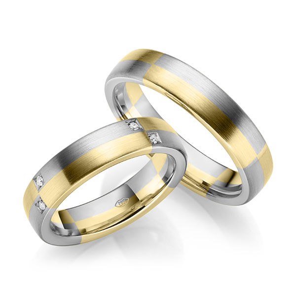 Set Bicolor trouwringen in geelgoud 14 kt. grijsgoud 14 kt. met in totaal 0,08 ct. Briljant tw/si Set Bicolor trouwringen in geelgoud 14 kt. grijsgoud 14 kt. met in totaal 0,08 ct. Briljant tw/si