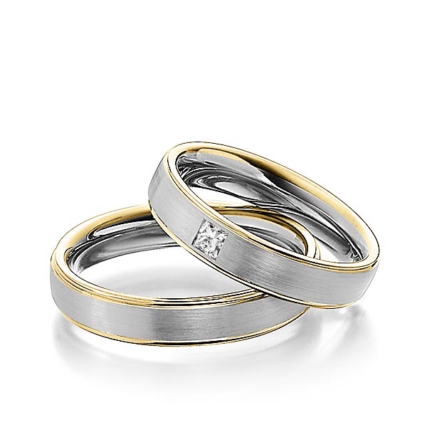 Set Bicolor trouwringen in geelgoud 14 kt. grijsgoud 14 kt. met in totaal 0,08 ct. Princess-Diamant tw/si van Steinberg