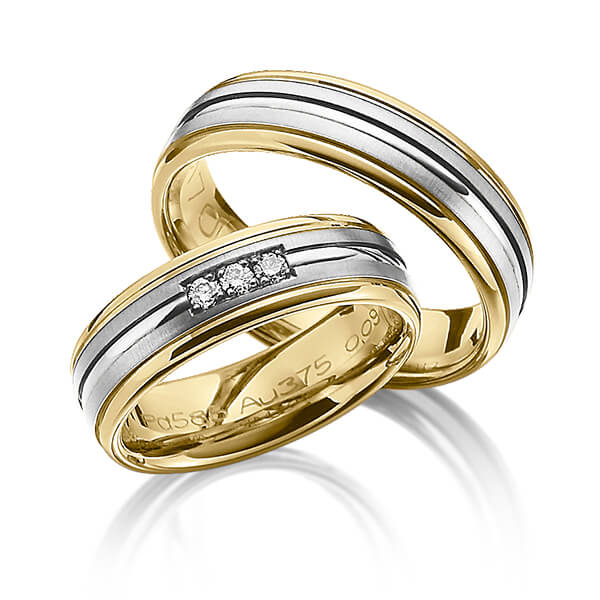 Set Bicolor trouwringen in geelgoud 14 kt. grijsgoud 14 kt. met in totaal 0,09 ct. Briljant tw/si van Merii