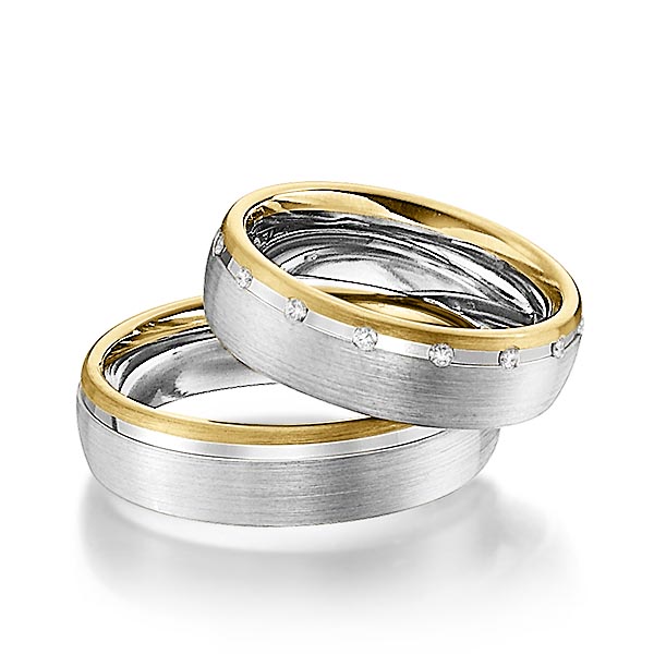 Set Bicolor trouwringen in geelgoud 14 kt. grijsgoud 14 kt. met in totaal 0,15 ct. Briljant tw/si van Steinberg
