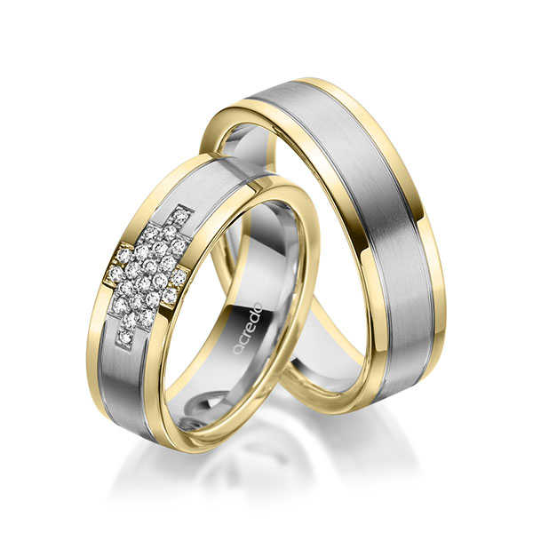 Set Bicolor trouwringen in geelgoud 14 kt. grijsgoud 14 kt. met in totaal 0,186 ct. Briljant tw/si van acredo