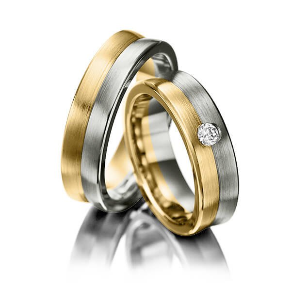 Set Bicolor trouwringen in geelgoud 14 kt. grijsgoud 14 kt. met in totaal 0,1 ct. Briljant tw/si van Eternal Touch
