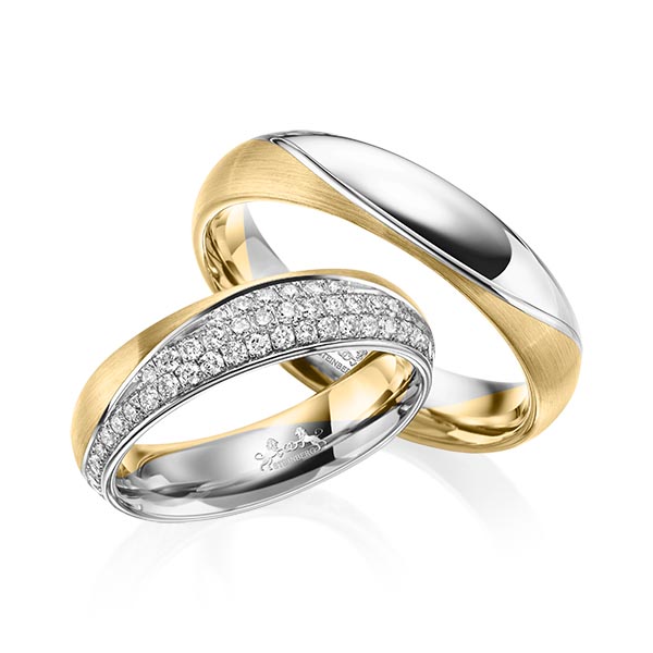 Set Bicolor trouwringen in geelgoud 14 kt. grijsgoud 14 kt. met in totaal 0,77 ct. Briljant tw/si van Steinberg
