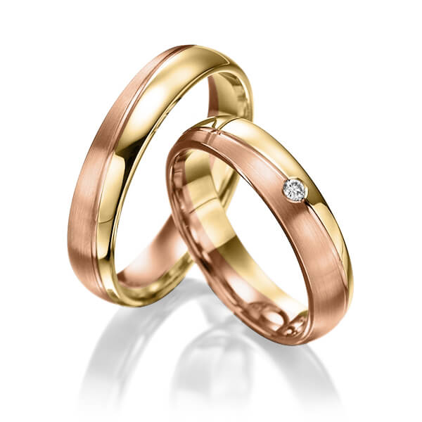 Set Bicolor trouwringen in geelgoud 14 kt. roodgoud 14 kt. met in totaal 0,015 ct. Briljant tw/si van Steinberg