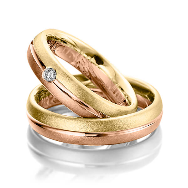 Set Bicolor trouwringen in geelgoud 14 kt. roodgoud 14 kt. met in totaal 0,02 ct. Briljant tw/si van Merii