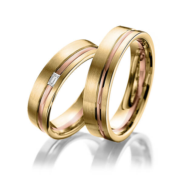 Set Bicolor trouwringen in geelgoud 14 kt. roodgoud 14 kt. met in totaal 0,05 ct. Baguette-Diamant tw,vs van Merii