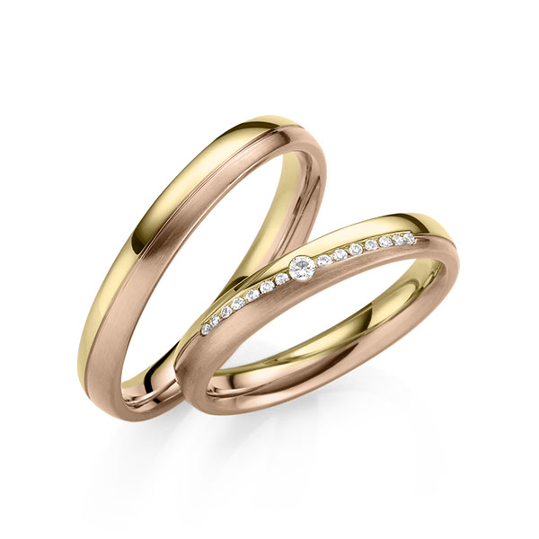 Set Bicolor trouwringen in geelgoud 14 kt. roodgoud 14 kt. met in totaal 0,095 ct. Briljant tw,vs van Eternal Touch