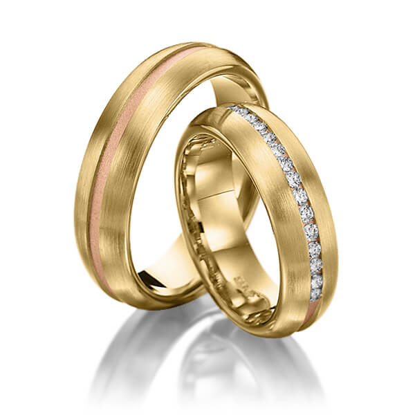 Set Bicolor trouwringen in geelgoud 14 kt. roodgoud 14 kt. met in totaal 0,225 ct. Briljant tw/si van Steinberg