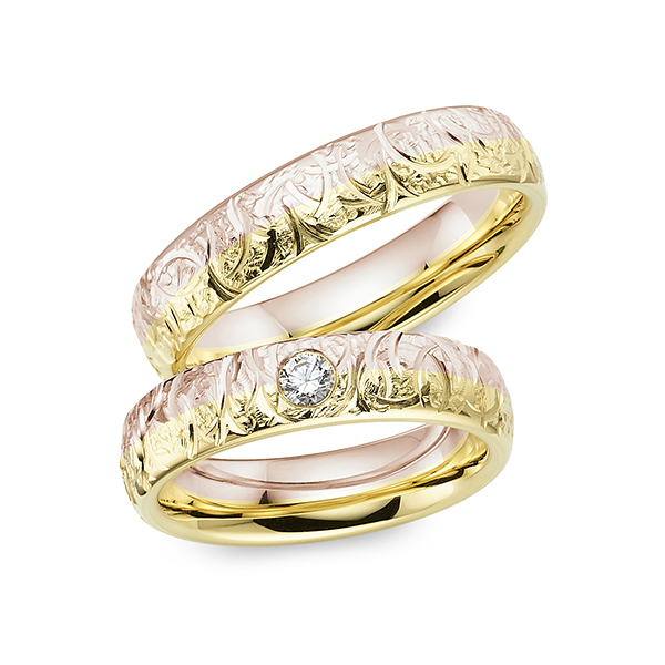 Set Bicolor trouwringen in geelgoud 14 kt. roségoud 14 kt. met in totaal 0,1 ct. Briljant tw/si van Merii