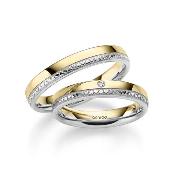 Set Bicolor trouwringen in geelgoud 14 kt. witgoud 14 kt. met in totaal 0,01 ct. Briljant tw/si van acredo