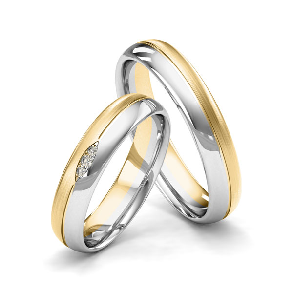 Set Bicolor trouwringen in geelgoud 14 kt. witgoud 14 kt. met in totaal 0,02 ct. Briljant tw/si van Merii