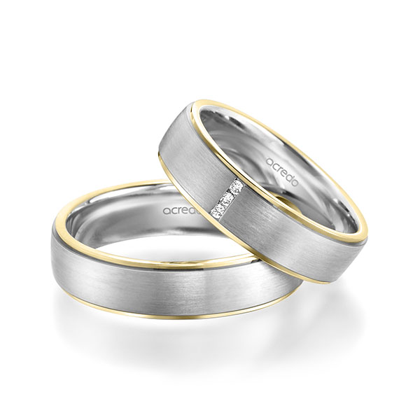 Set Bicolor trouwringen in geelgoud 14 kt. witgoud 14 kt. met in totaal 0,03 ct. Briljant tw/si van acredo