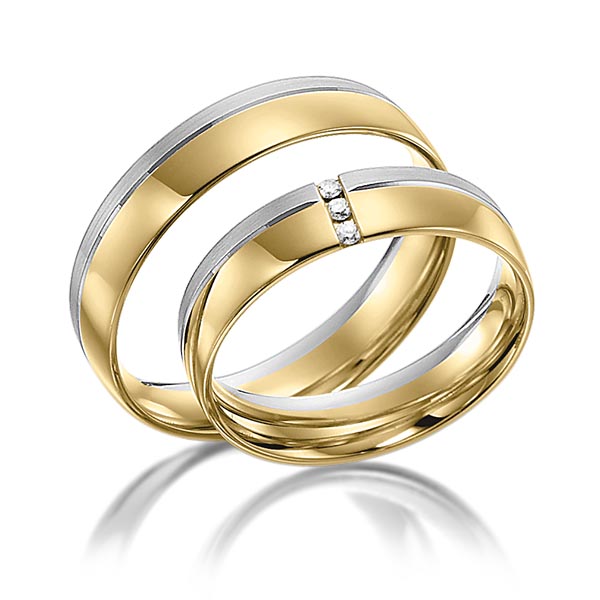 Set Bicolor trouwringen in geelgoud 14 kt. witgoud 14 kt. met in totaal 0,03 ct. Briljant tw/si van acredo Set Bicolor trouwringen in geelgoud 14 kt. witgoud 14 kt. met in totaal 0,03 ct. Briljant tw/si van acredo