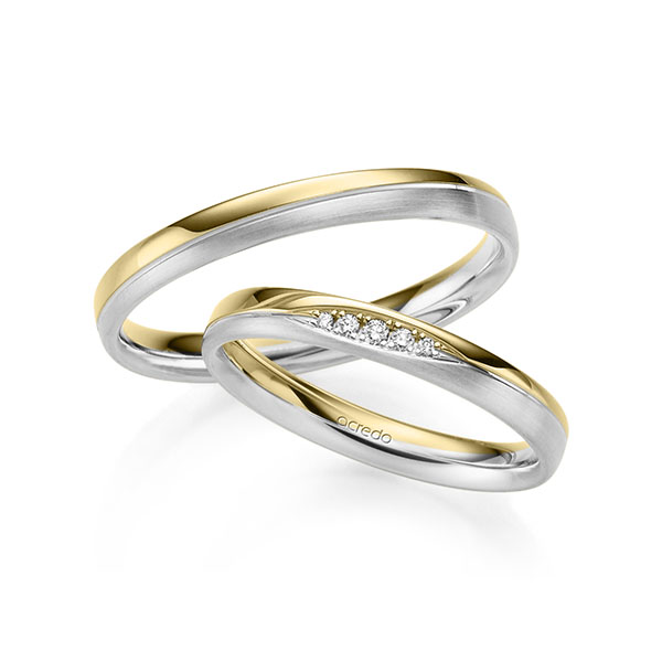 Set Bicolor trouwringen in geelgoud 14 kt. witgoud 14 kt. met in totaal 0,045 ct. Briljant tw/si van acredo
