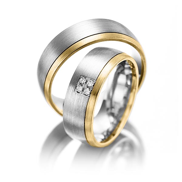 Set Bicolor trouwringen in geelgoud 14 kt. witgoud 14 kt. met in totaal 0,04 ct. Briljant tw/si van Steinberg