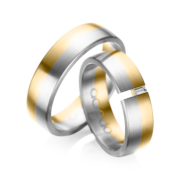 Set Bicolor trouwringen in geelgoud 14 kt. witgoud 14 kt. met in totaal 0,05 ct. Baguette-Diamant tw,vs van acredo