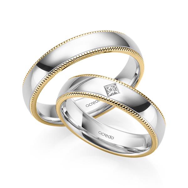 Set Bicolor trouwringen in geelgoud 14 kt. witgoud 14 kt. met in totaal 0,05 ct. Princess-Diamant tw/si van acredo