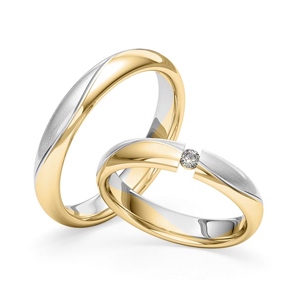 Set Bicolor trouwringen in geelgoud 14 kt. witgoud 14 kt. met in totaal 0,06 ct. Briljant tw/si van Merii