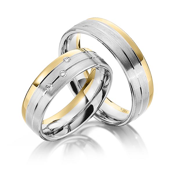 Set Bicolor trouwringen in geelgoud 14 kt. witgoud 14 kt. met in totaal 0,06 ct. Briljant tw/si van Steinberg