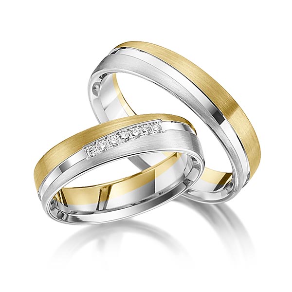 Set Bicolor trouwringen in geelgoud 14 kt. witgoud 14 kt. met in totaal 0,07 ct. Briljant tw/si van Steinberg