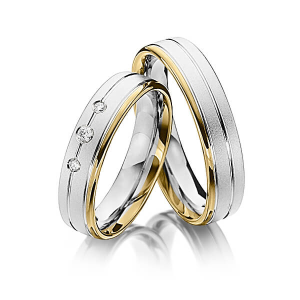 Set Bicolor trouwringen in geelgoud 14 kt. witgoud 14 kt. met in totaal 0,08 ct. Briljant tw/si van Steinberg
