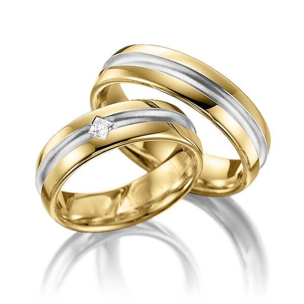 Set Bicolor trouwringen in geelgoud 14 kt. witgoud 14 kt. met in totaal 0,08 ct. Princess-Diamant tw,vs van Eternal Touch