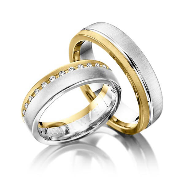 Set Bicolor trouwringen in geelgoud 14 kt. witgoud 14 kt. met in totaal 0,15 ct. Briljant tw/si van Eternal Touch
