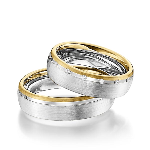 Set Bicolor trouwringen in geelgoud 14 kt. witgoud 14 kt. met in totaal 0,15 ct. Briljant tw/si van Steinberg