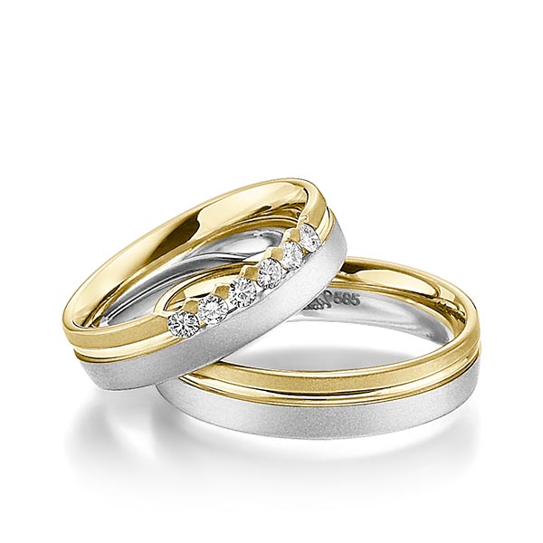 Set Bicolor trouwringen in geelgoud 14 kt. witgoud 14 kt. met in totaal 0,24 ct. Briljant tw/si van Steinberg