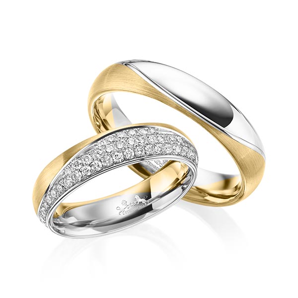 Set Bicolor trouwringen in geelgoud 14 kt. witgoud 14 kt. met in totaal 0,77 ct. Briljant tw/si van Steinberg