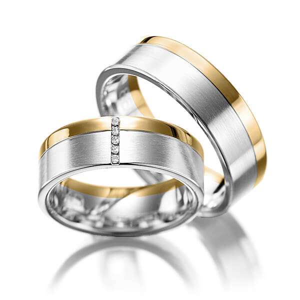 Set Bicolor trouwringen in geelgoud 14 kt. zilver 925 met in totaal 0,05 ct. Briljant tw/si van Merii