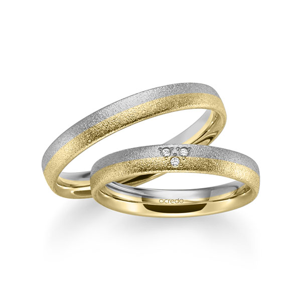 Set Bicolor trouwringen in grijsgoud 14 kt. geelgoud 14 kt. met in totaal 0,024 ct. Briljant tw/si van acredo