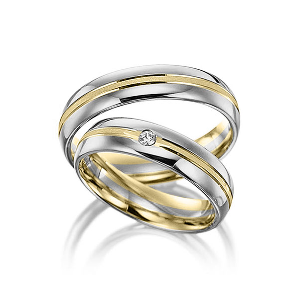 Set Bicolor trouwringen in grijsgoud 14 kt. geelgoud 14 kt. met in totaal 0,025 ct. Briljant tw/si van Merii