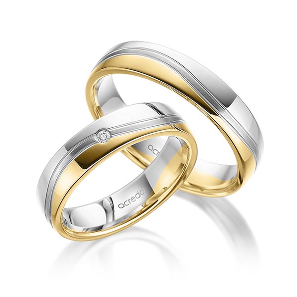 Set Bicolor trouwringen in grijsgoud 14 kt. geelgoud 14 kt. met in totaal 0,02 ct. Briljant tw/si van acredo