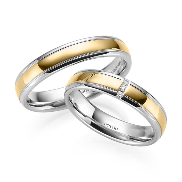Set Bicolor trouwringen in grijsgoud 14 kt. geelgoud 14 kt. met in totaal 0,03 ct. Briljant tw/si van acredo