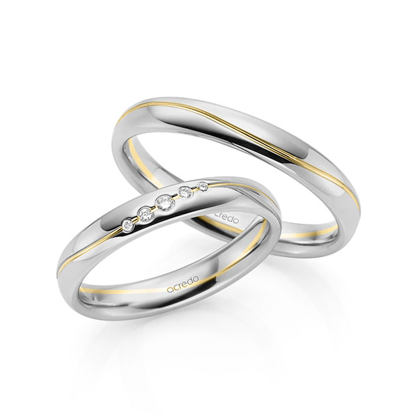Set Bicolor trouwringen in grijsgoud 14 kt. geelgoud 14 kt. met in totaal 0,041 ct. Briljant tw/si van acredo