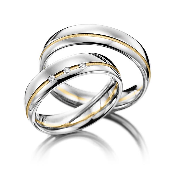 Set Bicolor trouwringen in grijsgoud 14 kt. geelgoud 14 kt. met in totaal 0,045 ct. Briljant tw/si van Steinberg
