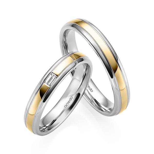 Set Bicolor trouwringen in grijsgoud 14 kt. geelgoud 14 kt. met in totaal 0,06 ct. Baguette-Diamant tw,vs van acredo