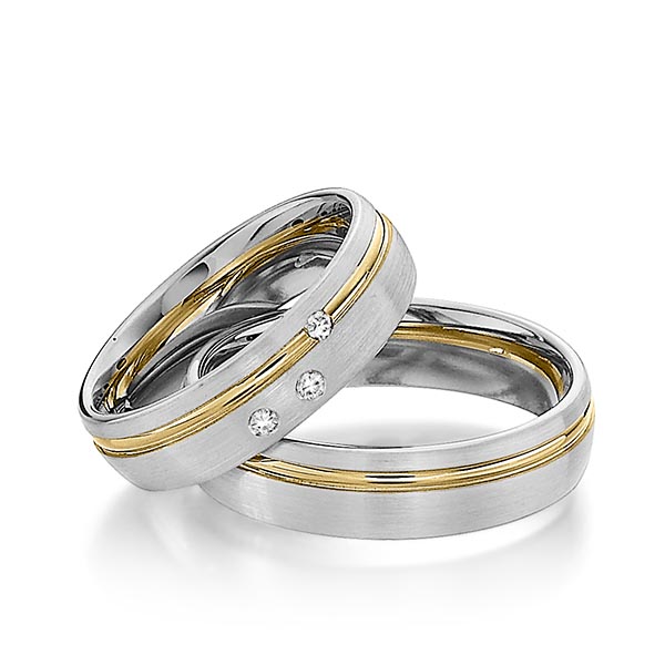 Set Bicolor trouwringen in grijsgoud 14 kt. geelgoud 14 kt. met in totaal 0,06 ct. Briljant tw/si van Steinberg