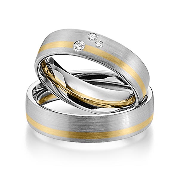 Set Bicolor trouwringen in grijsgoud 14 kt. geelgoud 14 kt. met in totaal 0,07 ct. Briljant tw/si van Steinberg